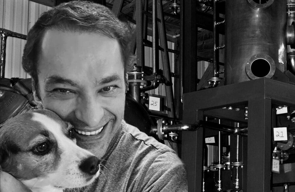 Ali Ansari, founder of Limited Spirits, inside the distillery beside the custom copper pot still